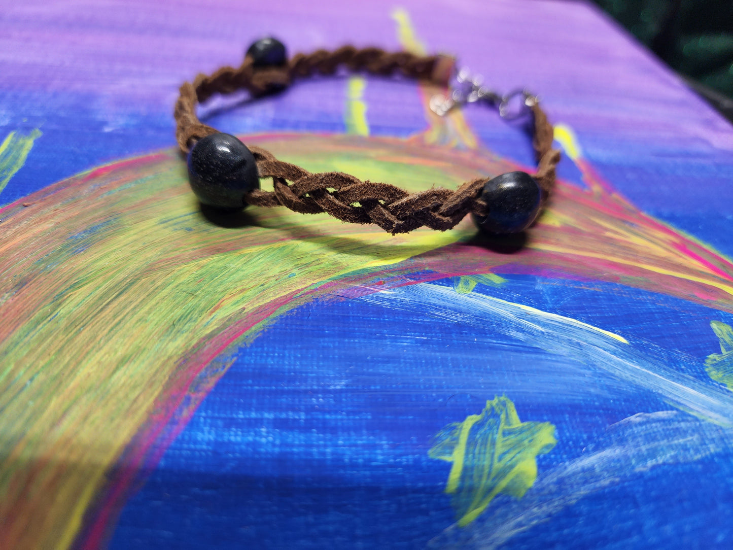 Cremation bead and leather braided bracelet